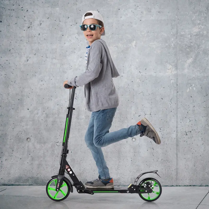 Green Kick Scooter With Height-Adjustable Handlebars And Shock-Absorbing Suspension 1